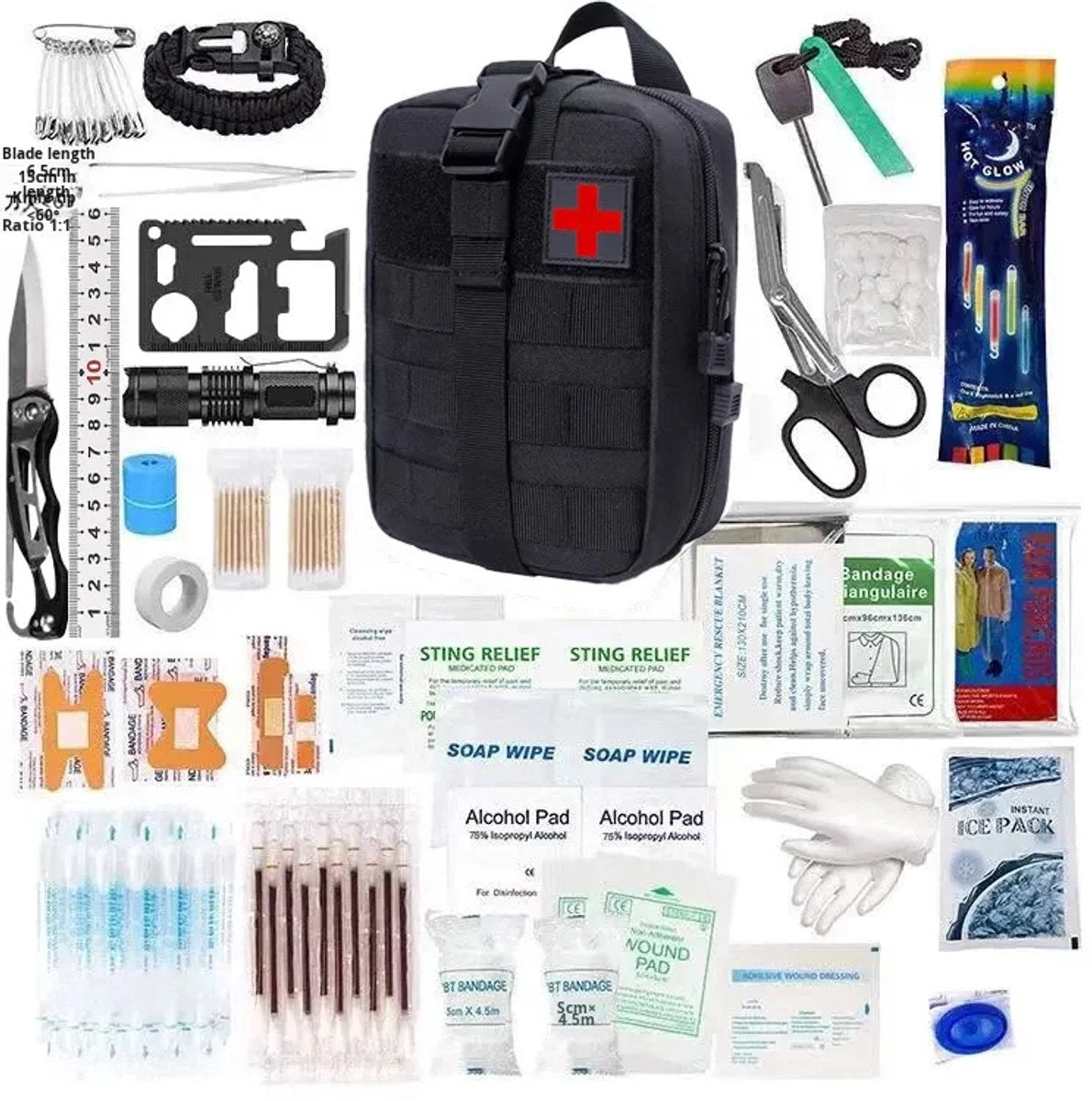 Complete 33-delige EHBO- en survivalset uitgestald met tactische tas, zakmes, zaklamp en eerste hulp artikelen
